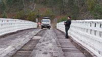 20-Helen watches another convoy cross McKillops Bridge